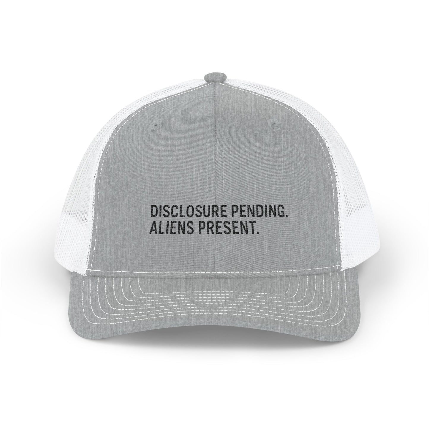 A light gray and white trucker hat with black text on the front panel reading 'DISCLOSURE PENDING. ALIENS PRESENT.